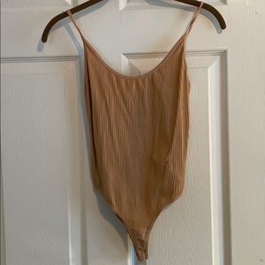 Seamless nude thong bodysuit